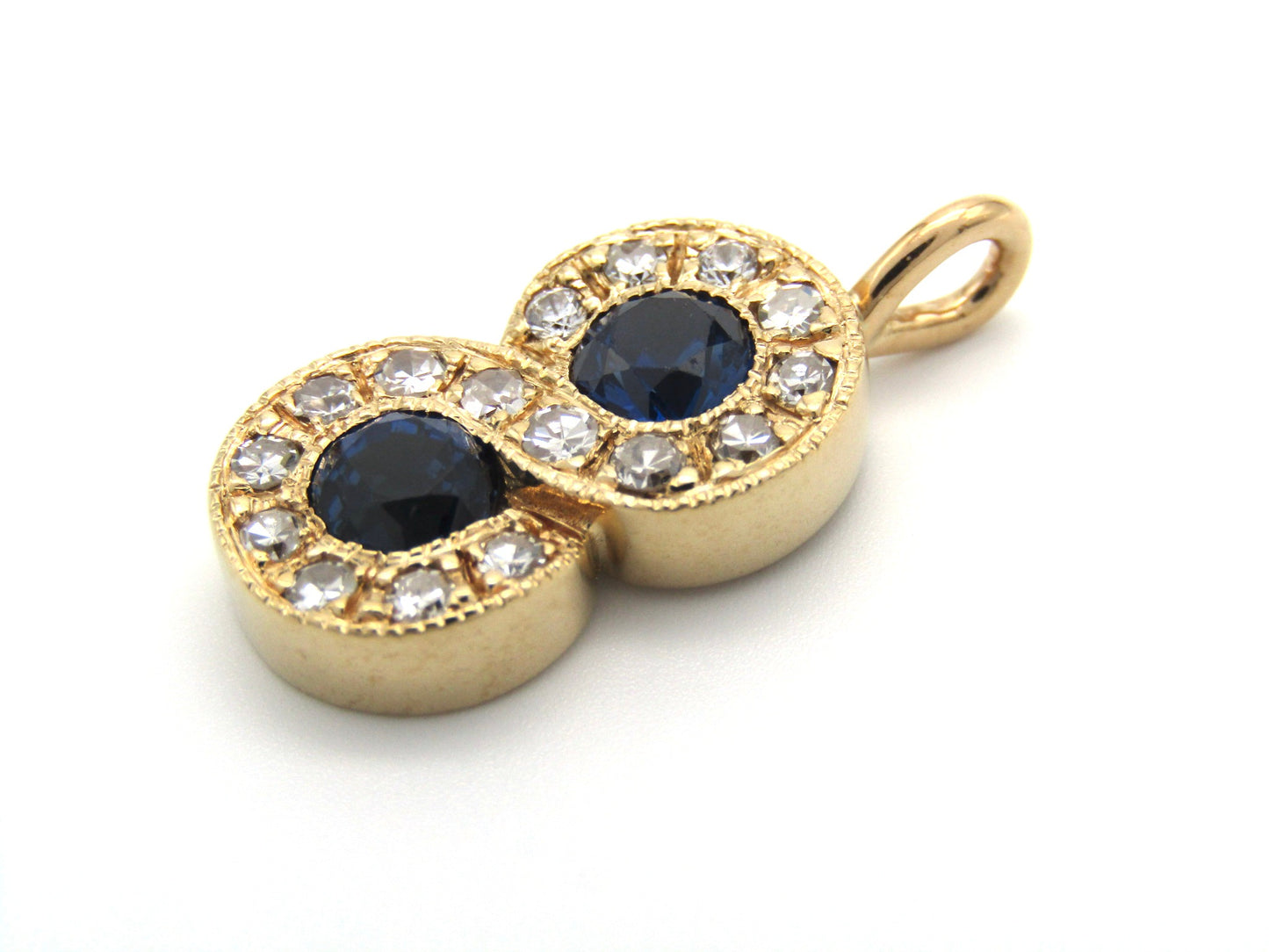 Vintage, 14K gold sapphire and diamond eternity pendant