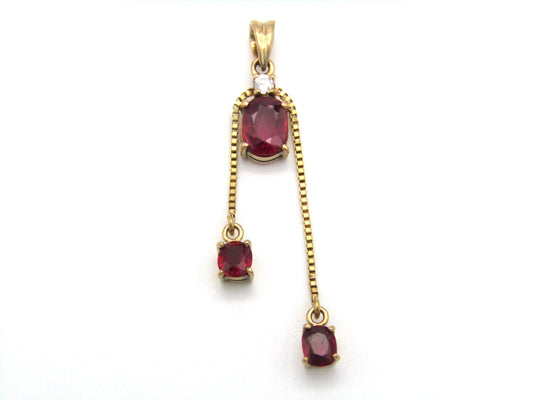 Mid-century, 14K gold ruby and diamond tassel pendant