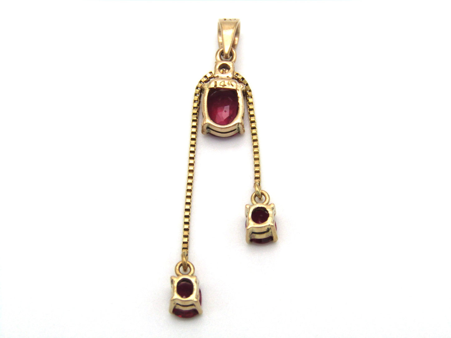 Mid-century, 14K gold ruby and diamond tassel pendant