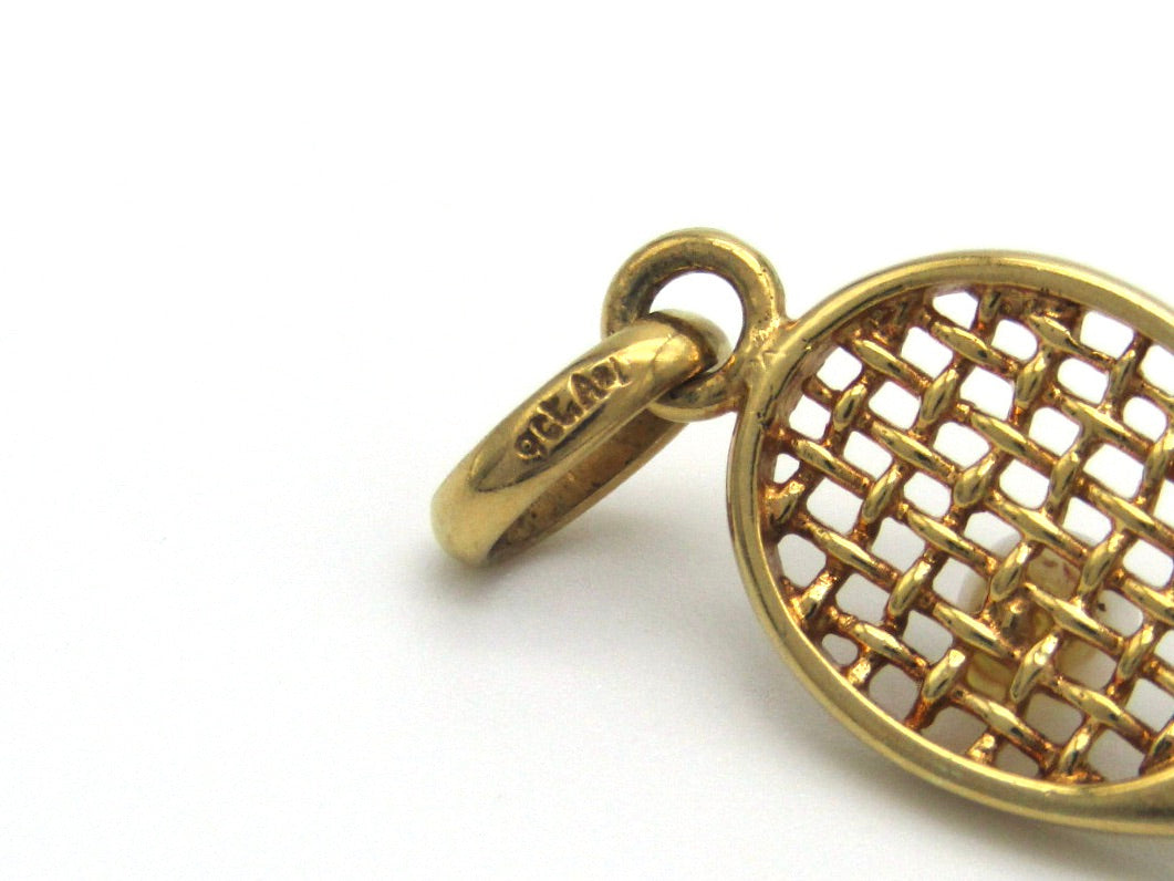 Vintage, 9K gold tennis racket and pearl ball pendant