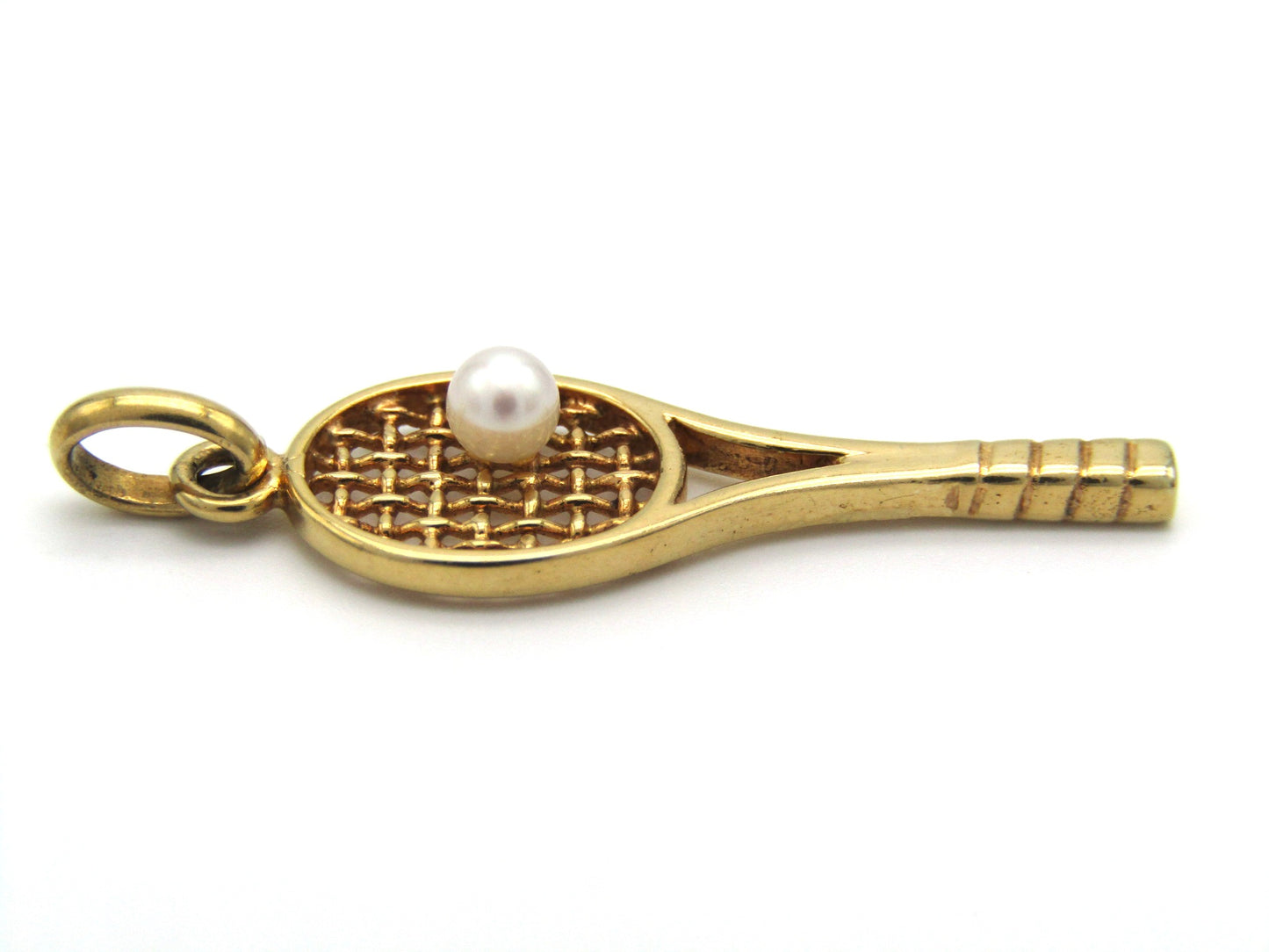 Vintage, 9K gold tennis racket and pearl ball pendant