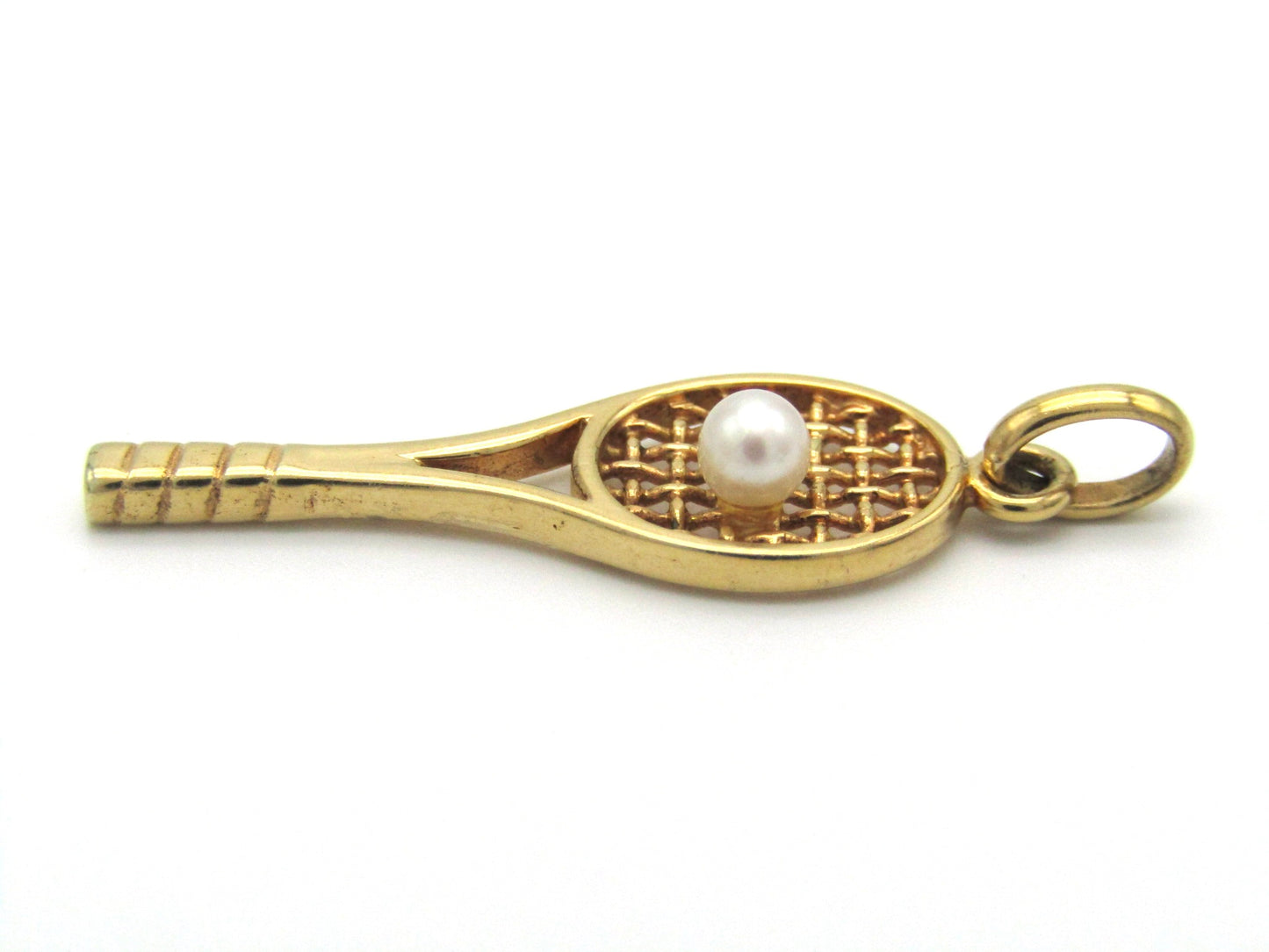 Vintage, 9K gold tennis racket and pearl ball pendant