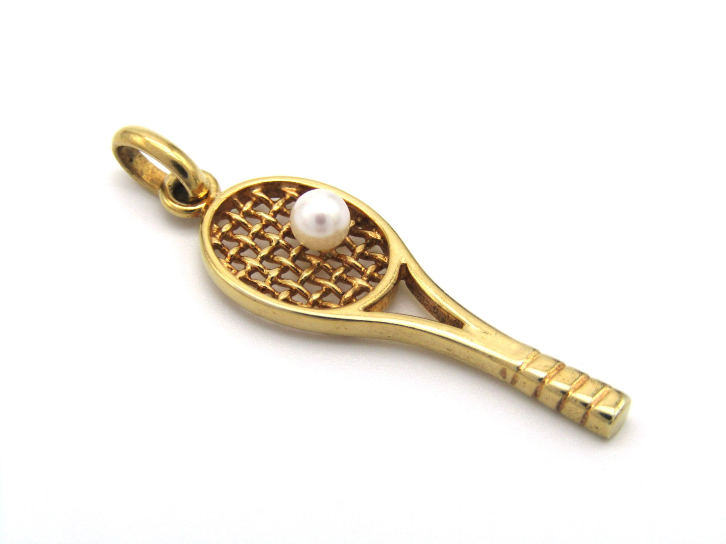 Vintage, 9K gold tennis racket and pearl ball pendant