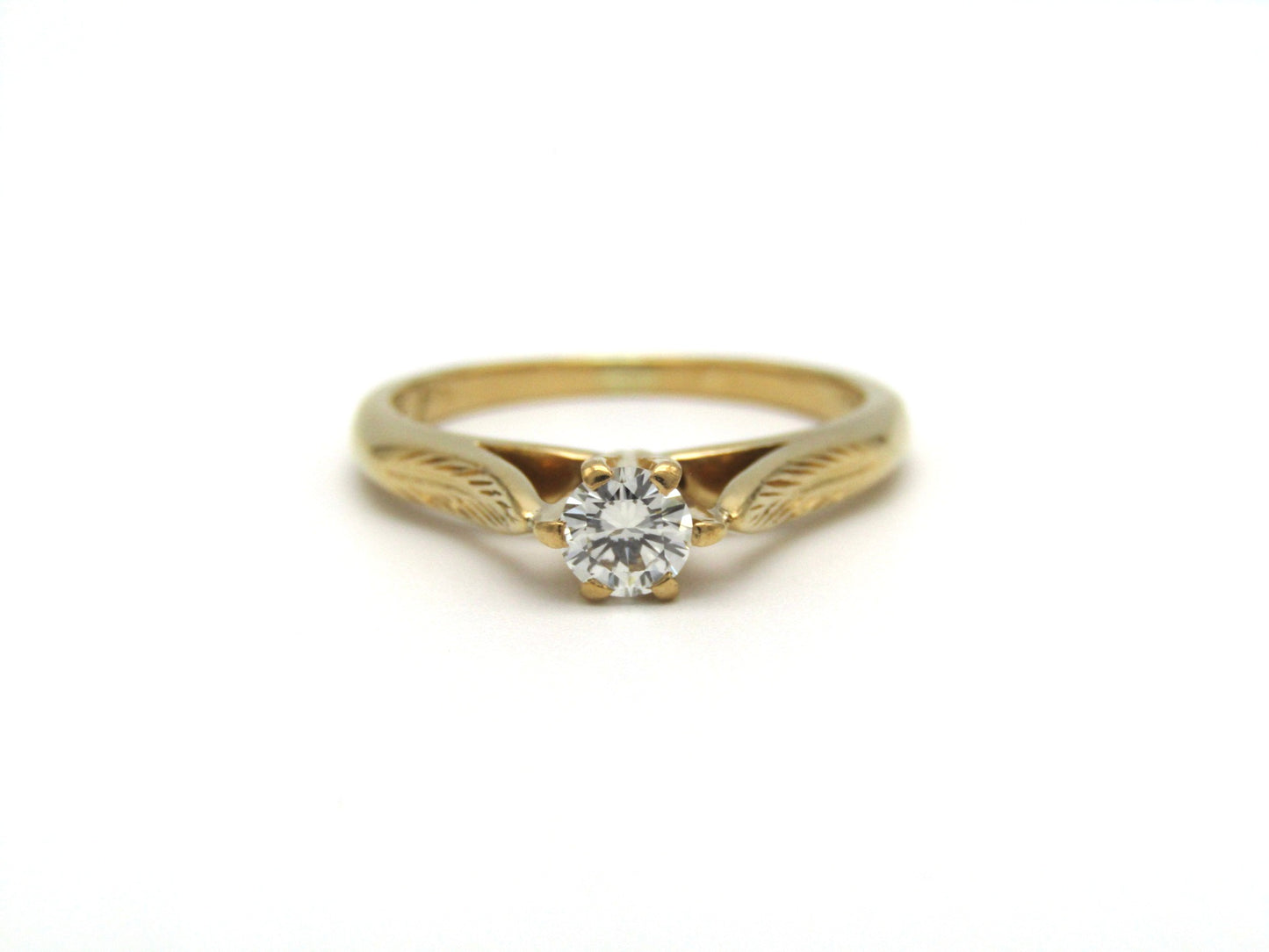 Mid-century, 18K gold diamond solitaire ring