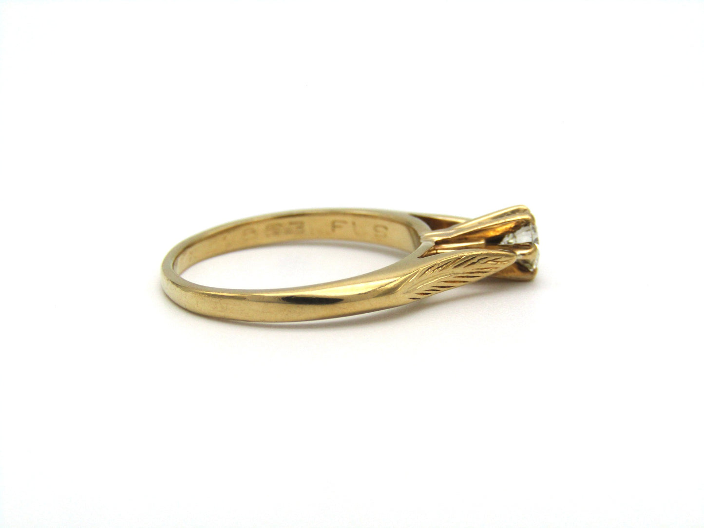 Mid-century, 18K gold diamond solitaire ring
