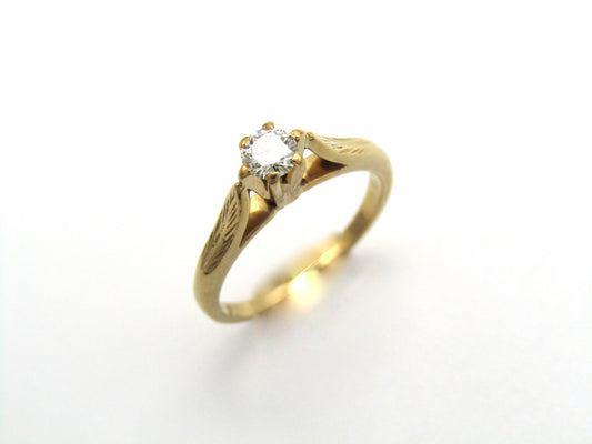 Mid-century, 18K gold diamond solitaire ring