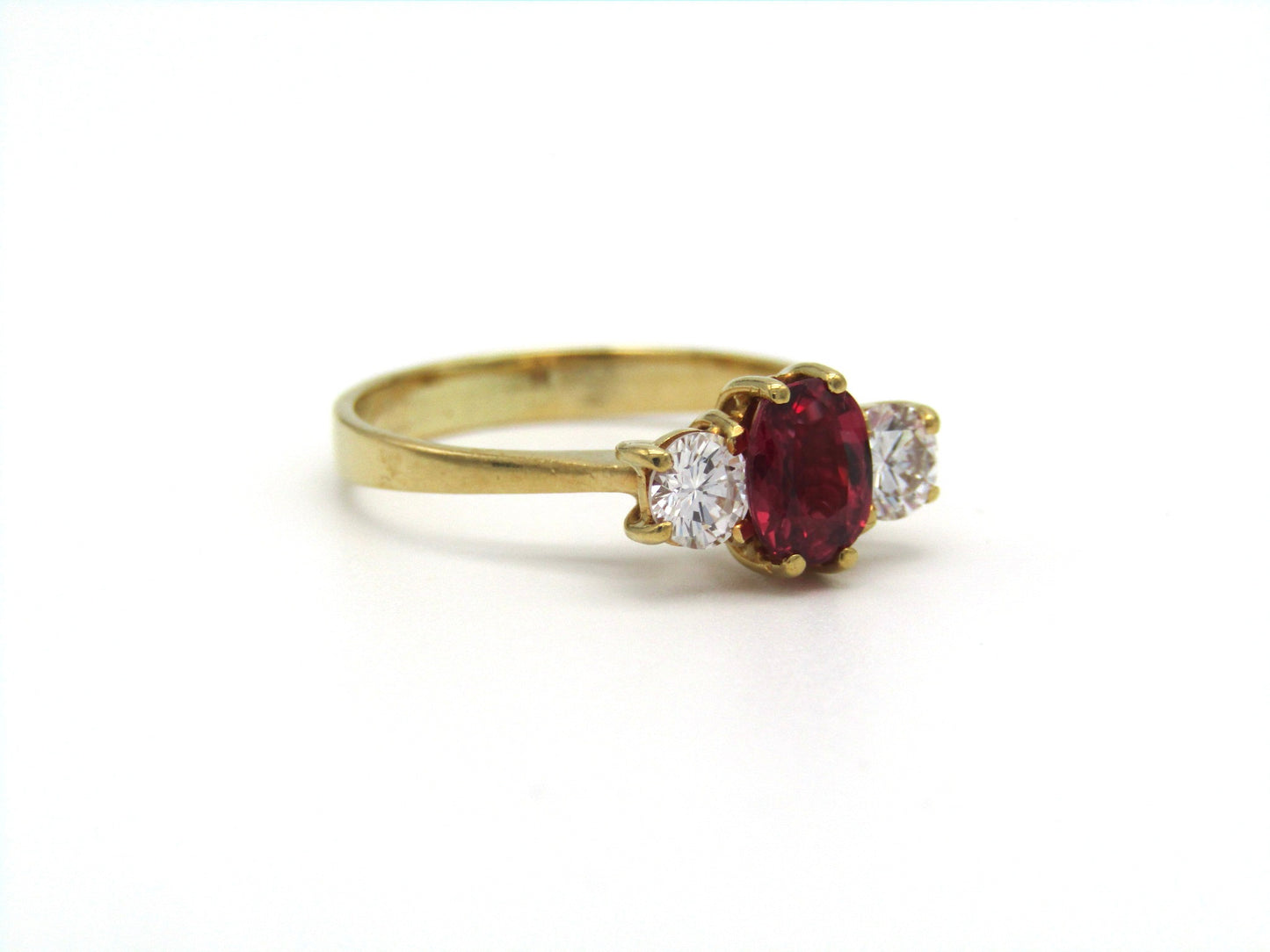 Vintage, 18K gold ruby and diamond trilogy ring