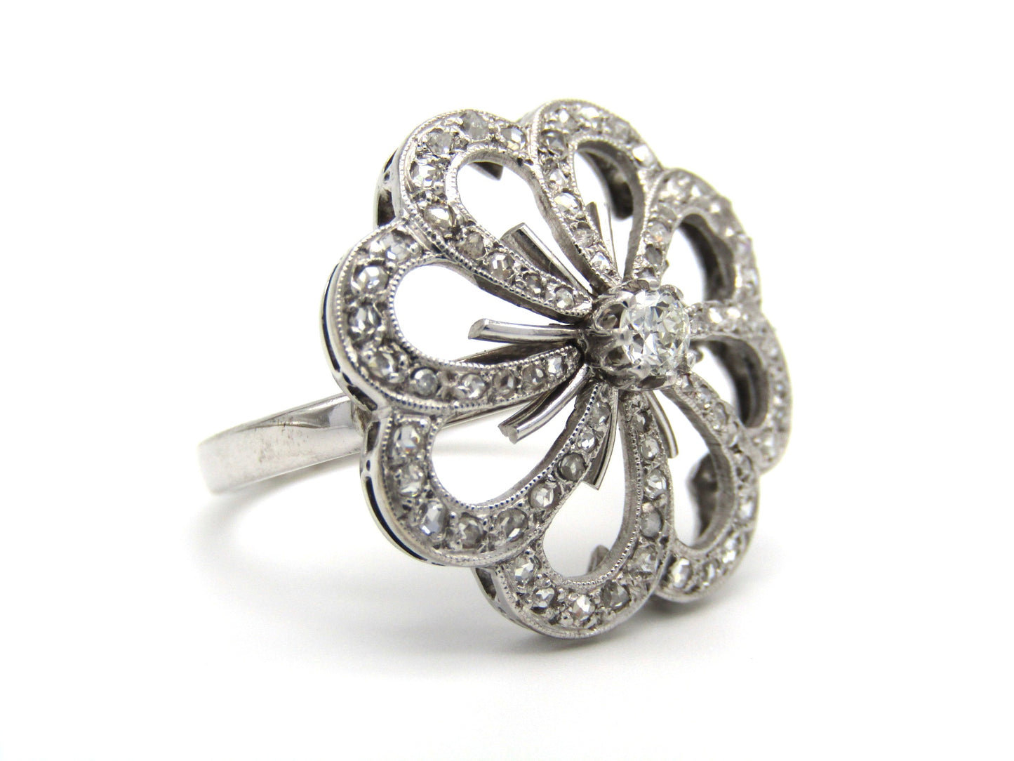 Mid-century, 18K gold diamond flower ring