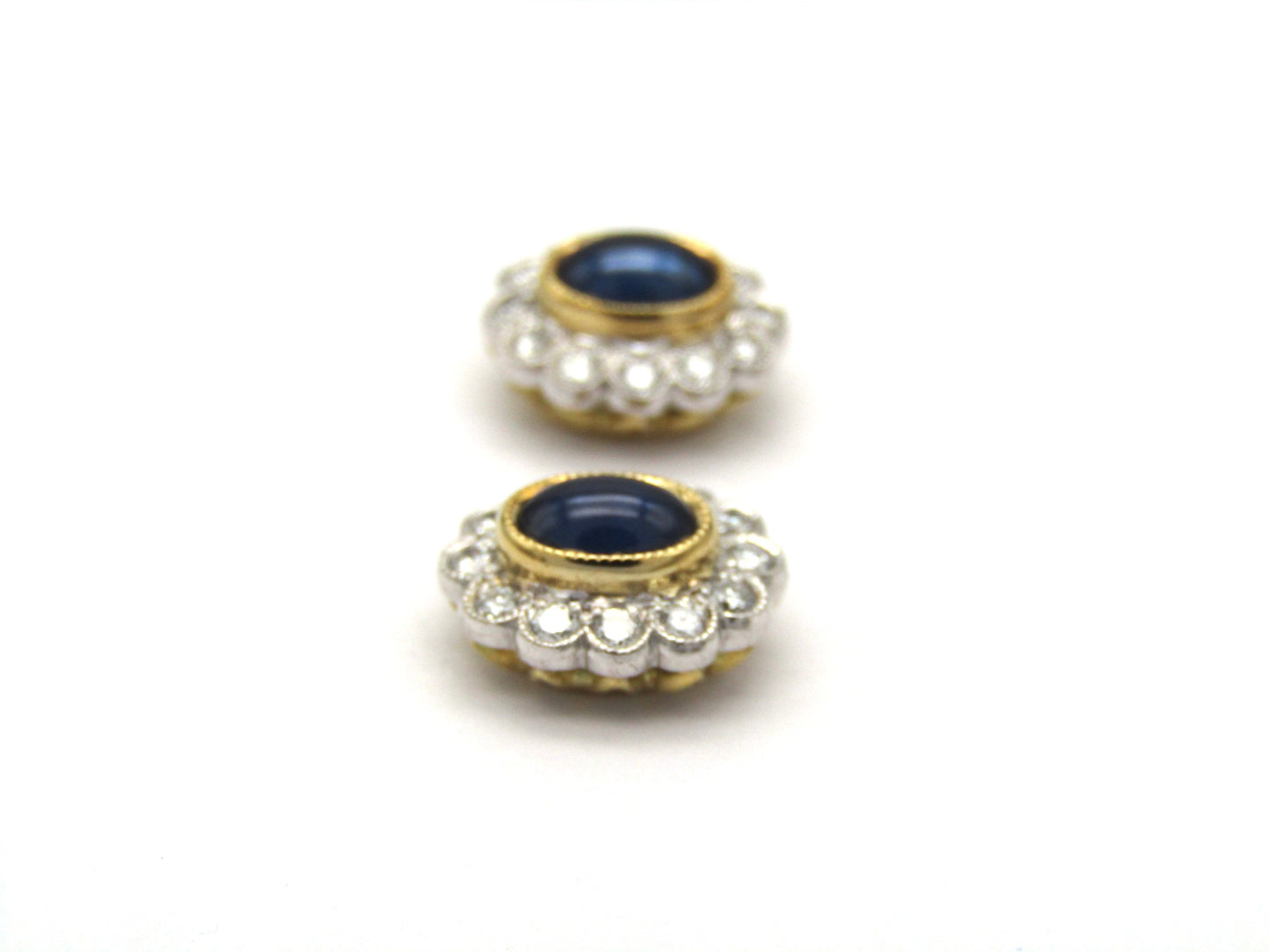 Estate, 18K gold sapphire and diamond earrings by Charles Greig