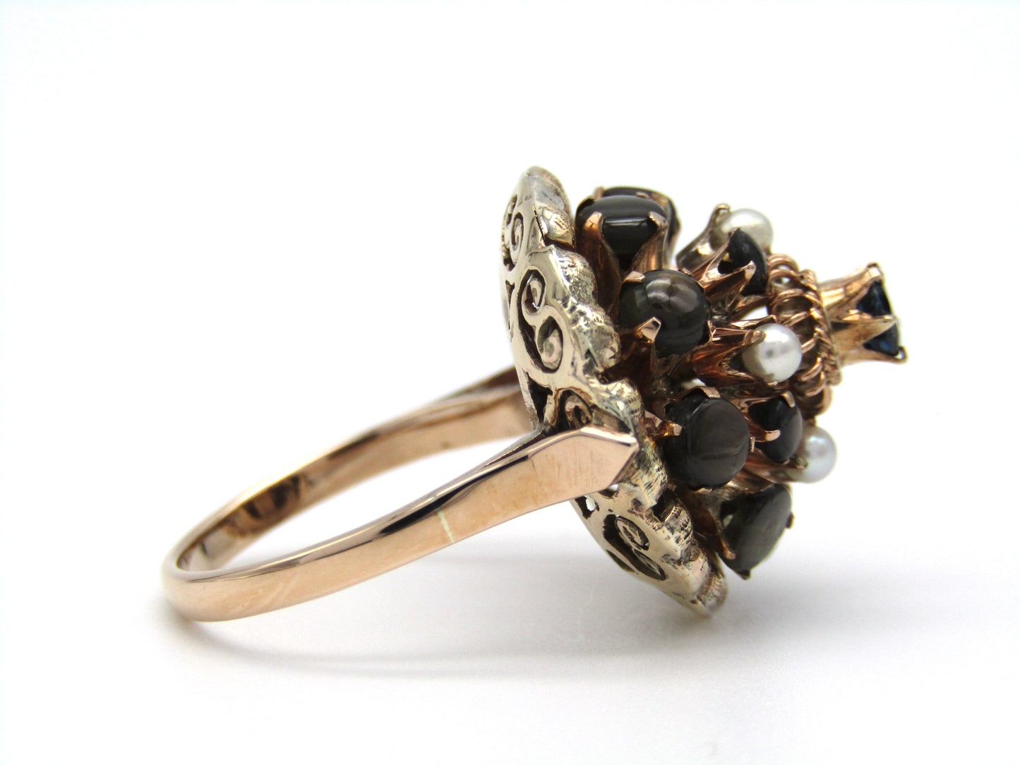 Mid-century, 14K gold blue sapphire, brown star sapphire, and pearl Thai Princess 'spinner' ring