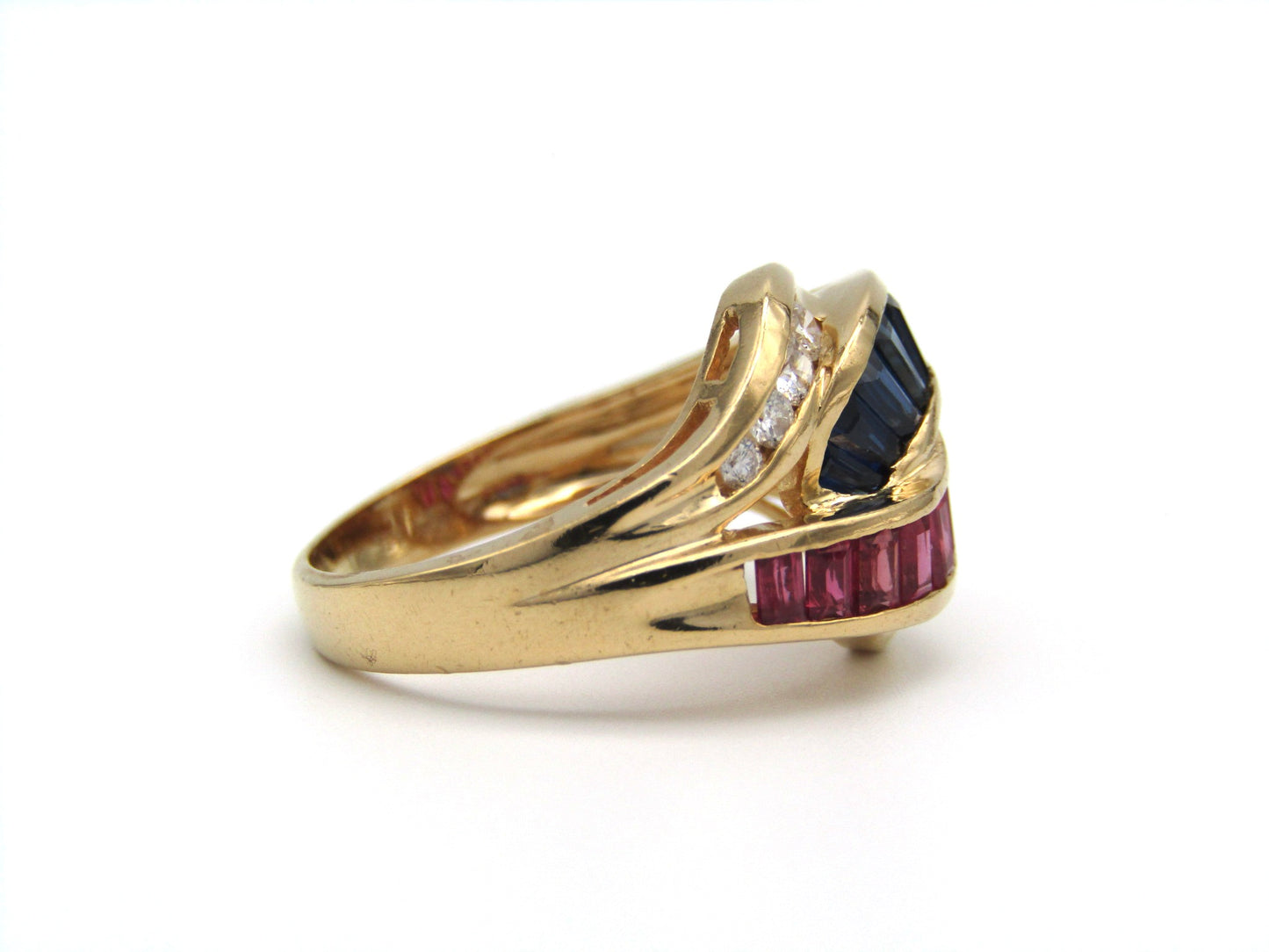 Vintage, 18K gold ruby, sapphire, and diamond bypass ring, c.1980s