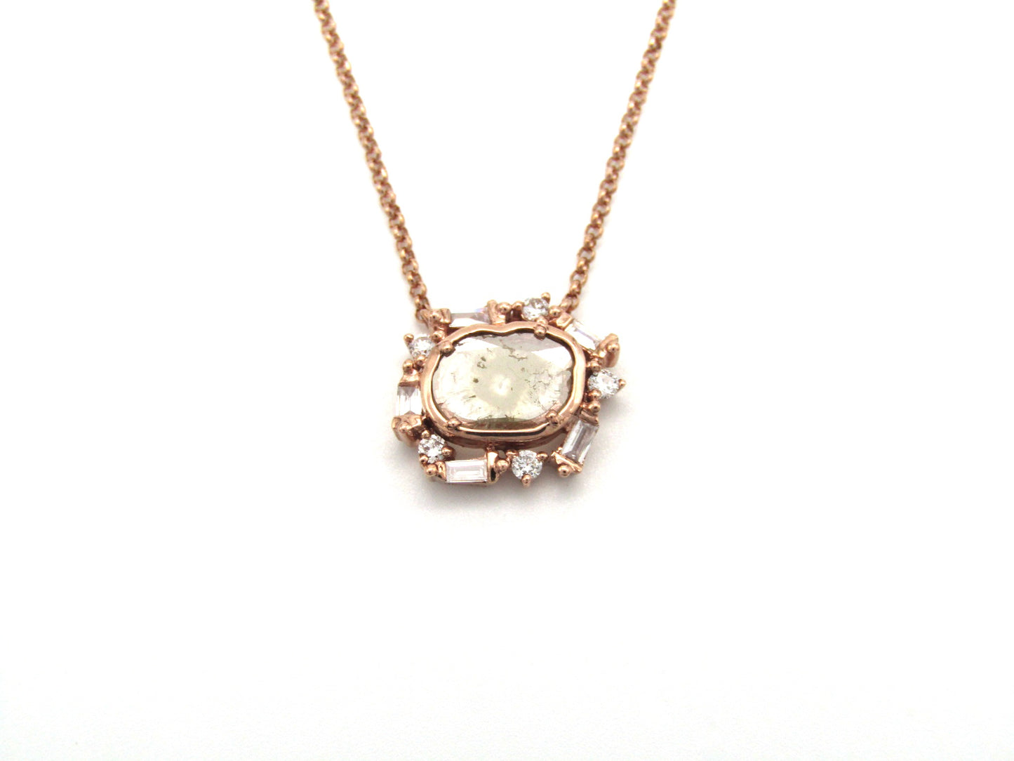 Estate, 9K gold diamond 'slice' necklace