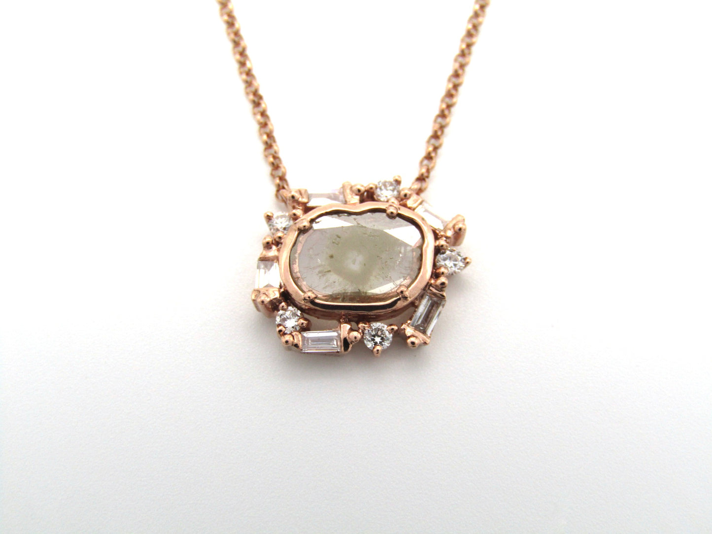 Estate, 9K gold diamond 'slice' necklace