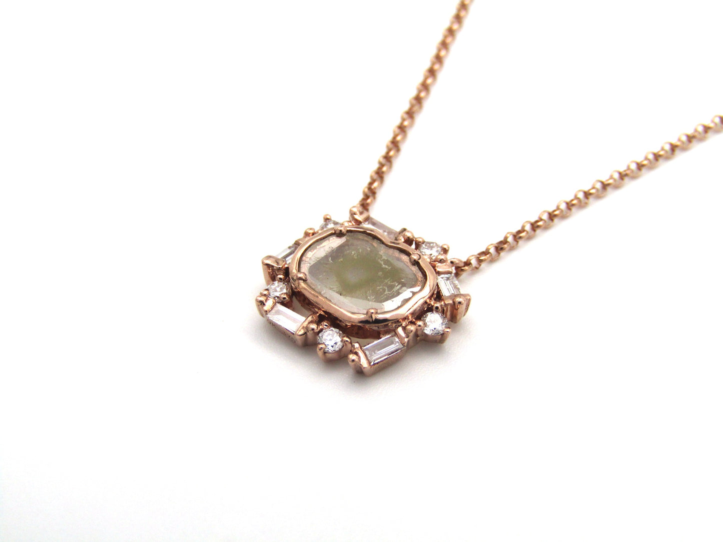 Estate, 9K gold diamond 'slice' necklace
