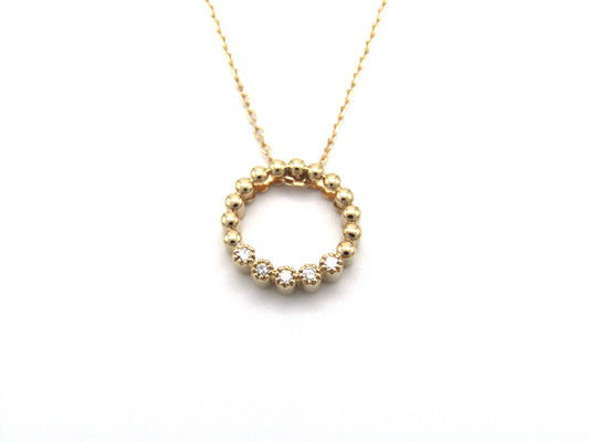 Estate, 9K gold diamond 'circle' pendant