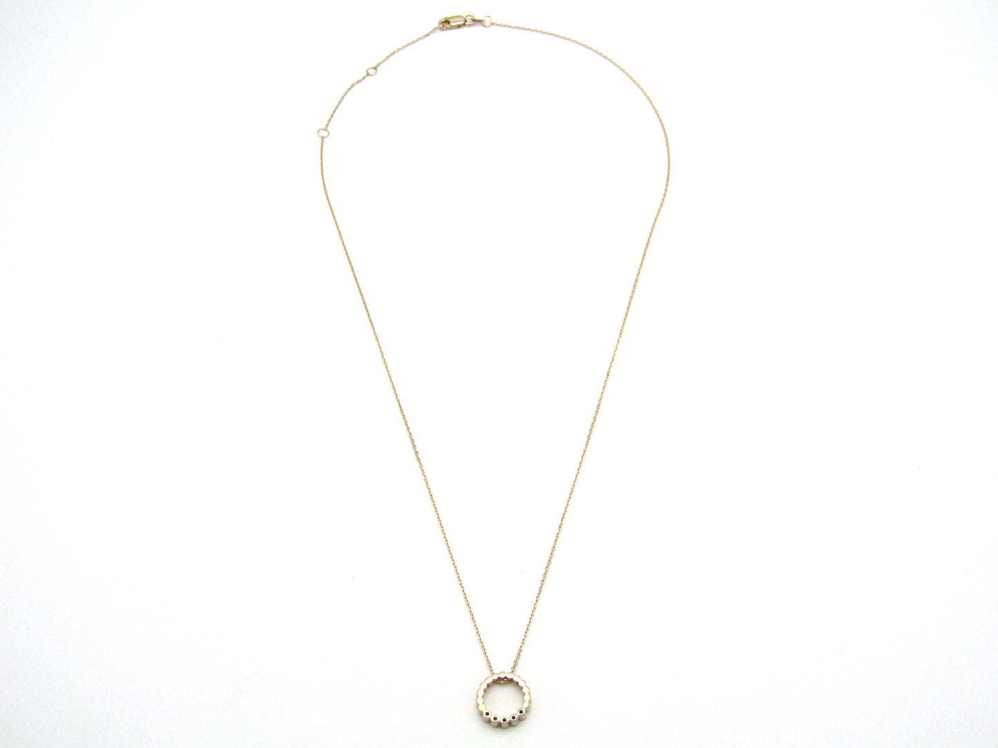 Estate, 9K gold diamond 'circle' pendant