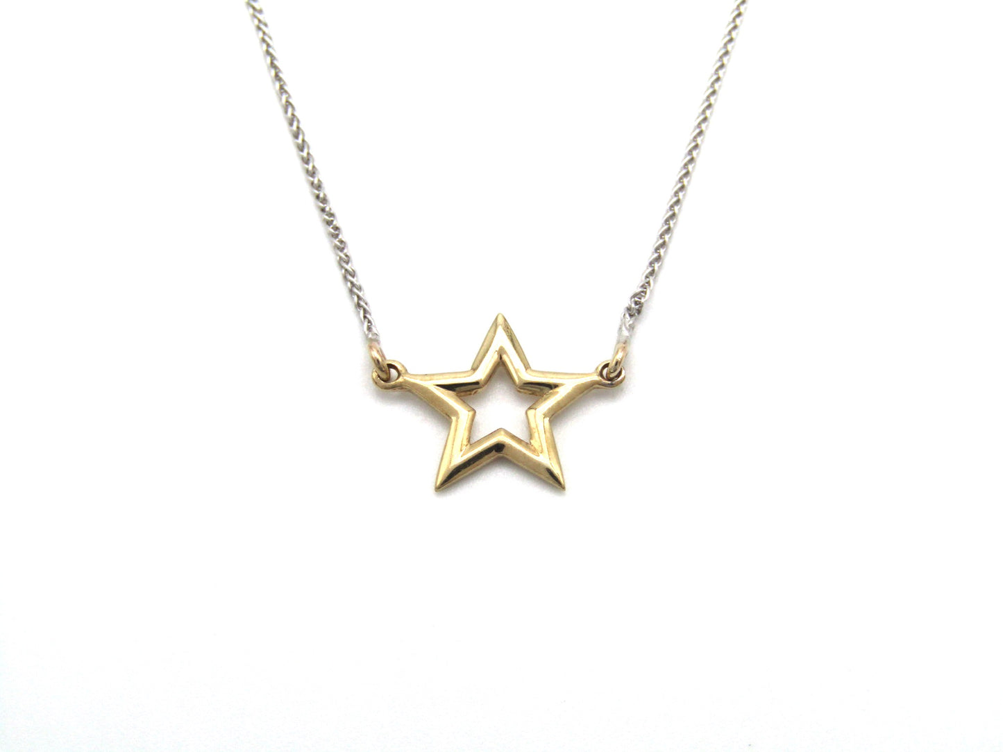 Estate, 9K gold 'star' necklace