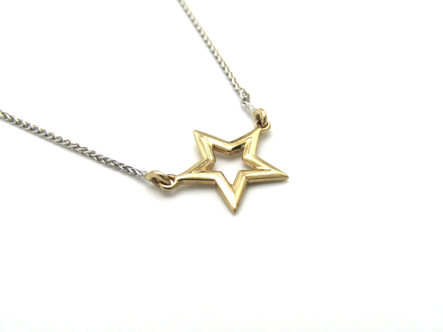 Estate, 9K gold 'star' necklace