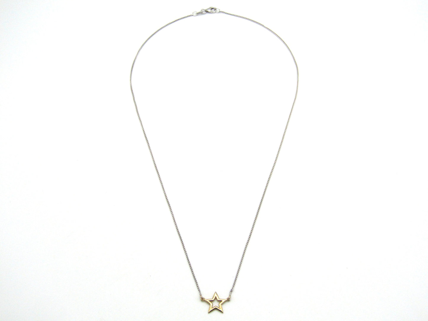 Estate, 9K gold 'star' necklace