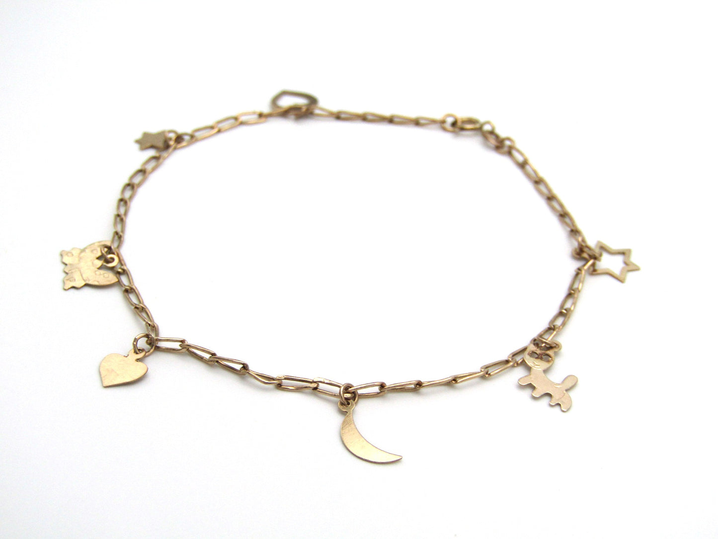 Estate, 9K gold charm bracelet