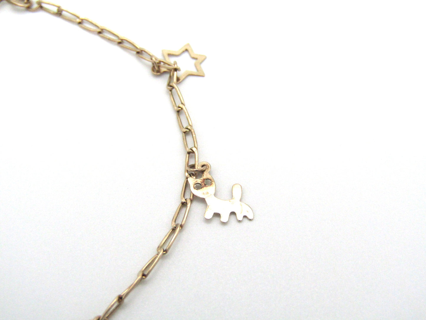 Estate, 9K gold charm bracelet