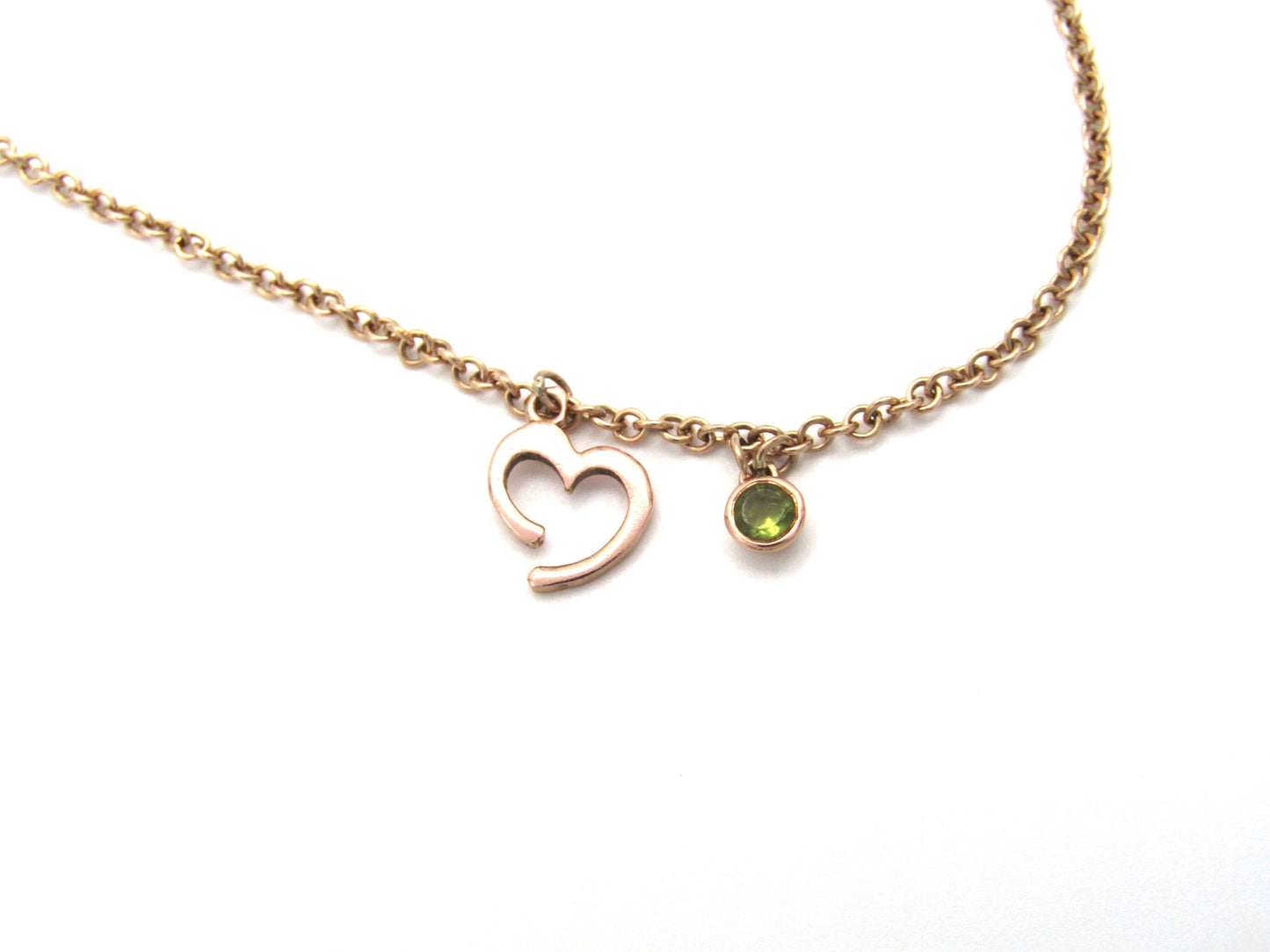 Estate, 9K gold peridot and open heart necklace