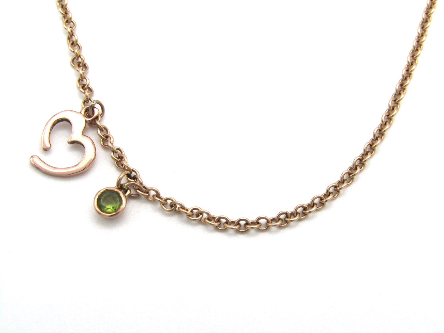 Estate, 9K gold peridot and open heart necklace