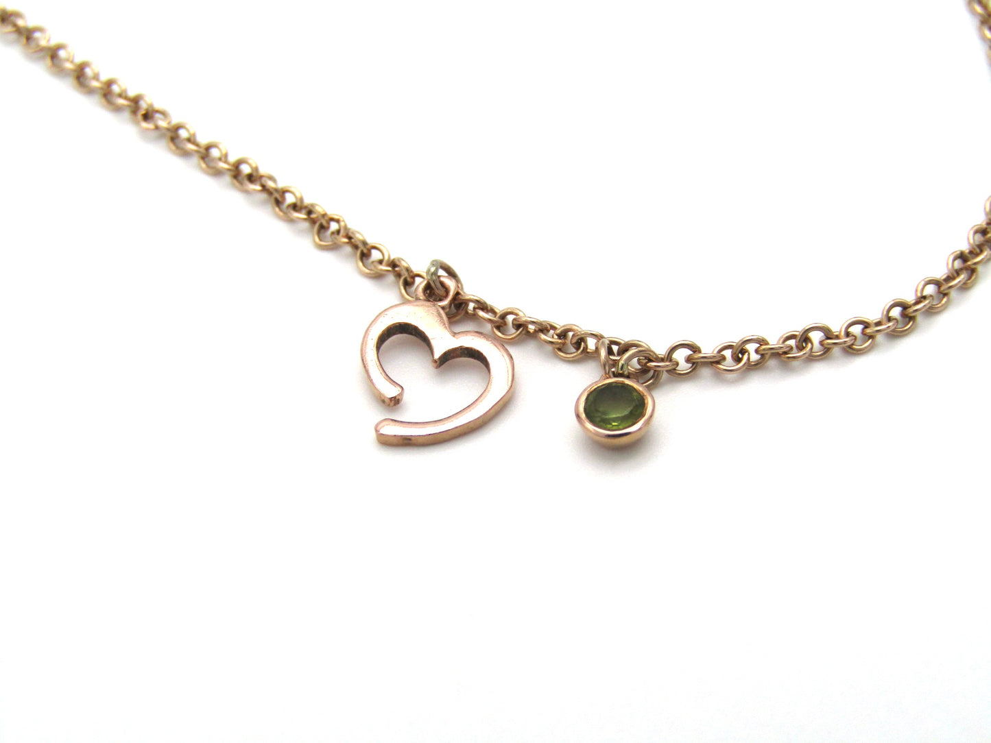 Estate, 9K gold peridot and open heart necklace