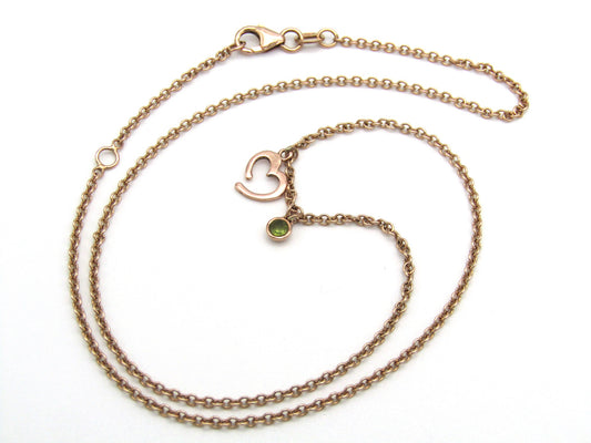 Estate, 9K gold peridot and open heart necklace