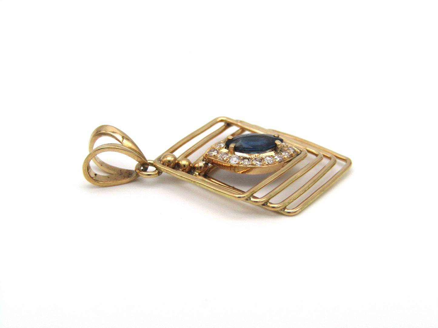 Estate, 18K gold sapphire and diamond pendant