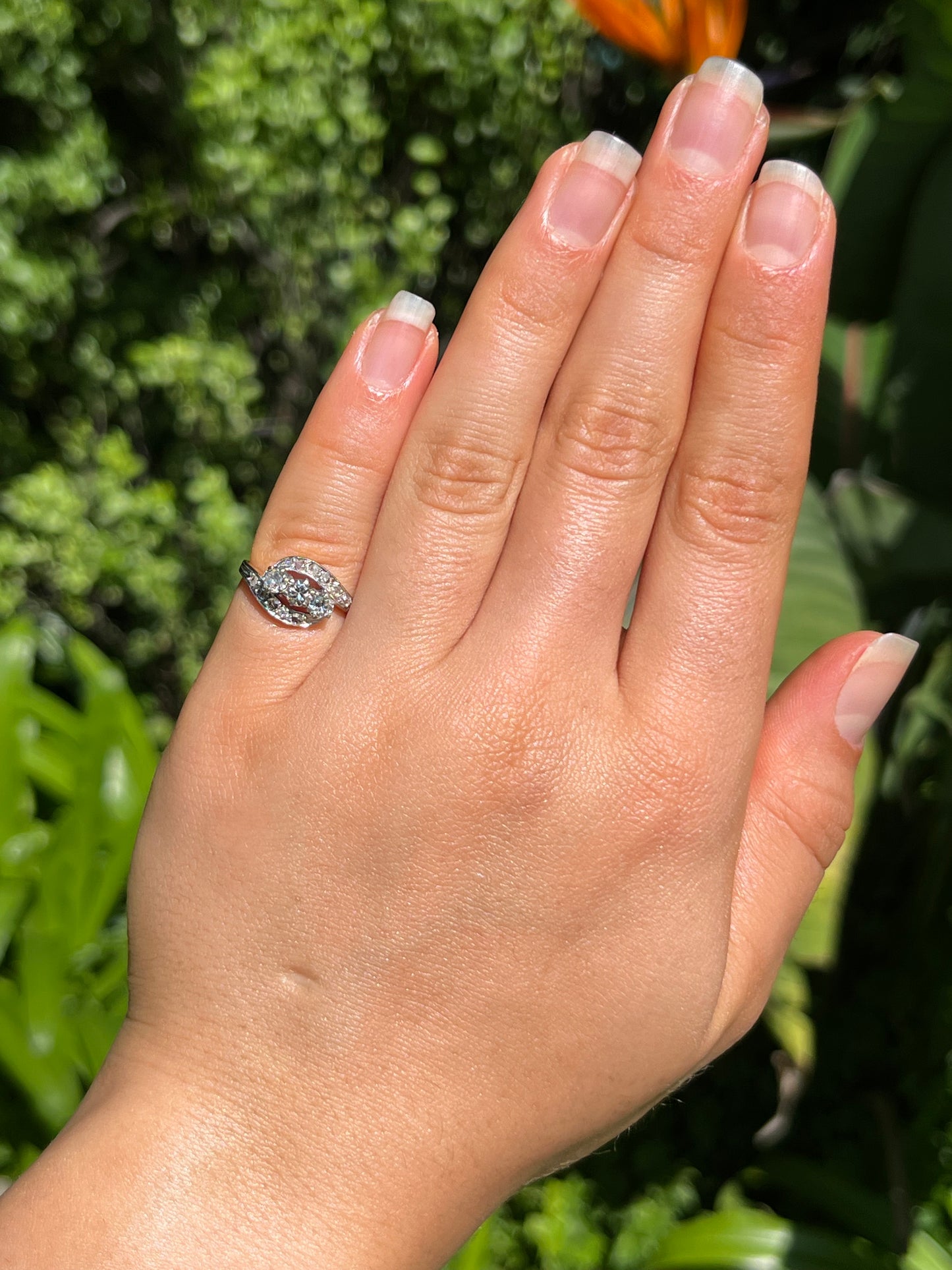Mid-century, 18K gold trilogy diamond bypass ring
