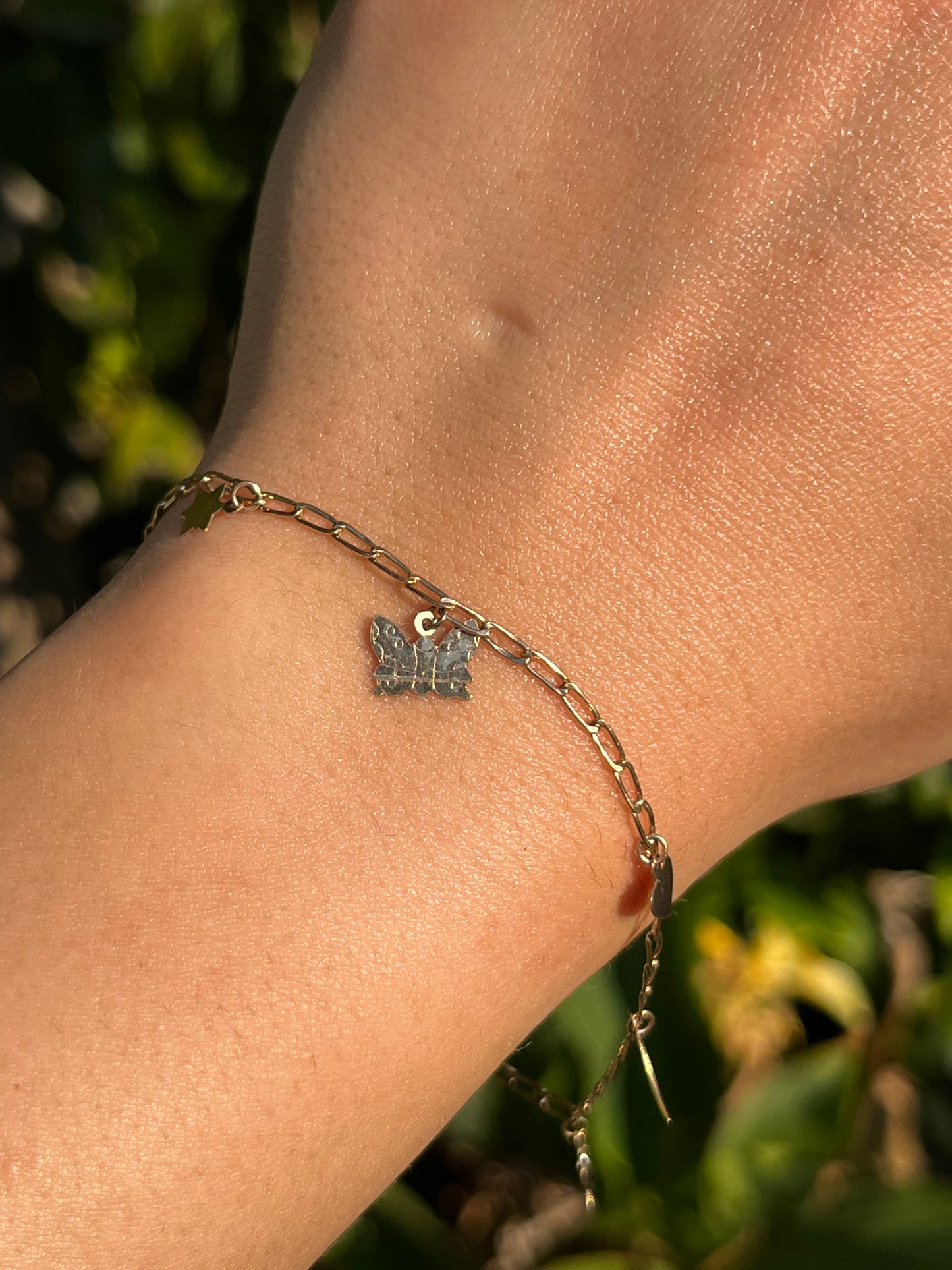 Estate, 9K gold charm bracelet